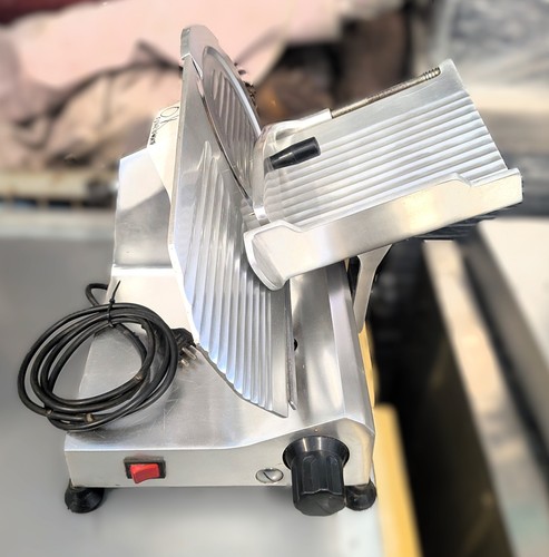 Affettatrice elettrica - , a